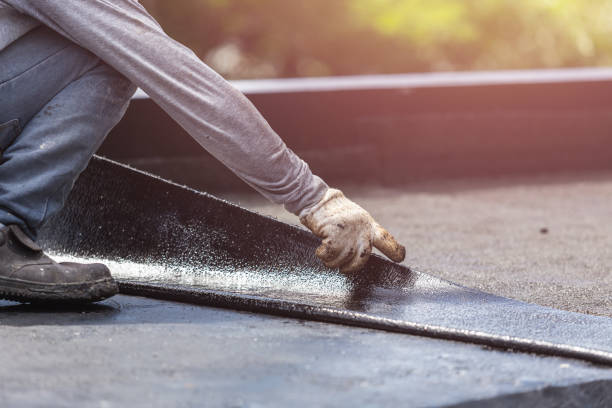 Professional Basement Waterproofing technician working in Medford, NJ